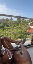 Kira Michelle Vibes And Squirts On The Balcony
