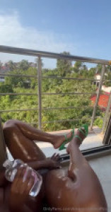 Kira Michelle Vibes And Squirts On The Balcony
