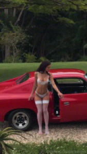 RachelCook Flaunts Her Boobs In A Classic Car