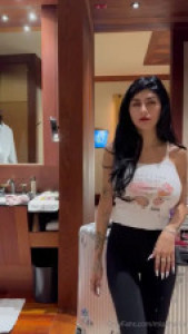 Mia Khalifa Goes Topless While Getting Ready For A Night Out