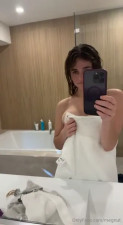 Megan Guthrie's Boobs Tease In The Bathroom